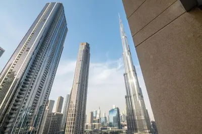 a view of a city skyline with tall buildings at 2-Bedroom Apartment with Full Burj Khalifa & Opera House Views Just 9 Min Walk to Dubai Mall! in Dubai