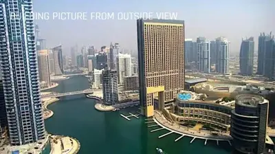 a picture of a city with a river and buildings at JW Marriot Hotel Residence - Two bedroom Suite in Dubai