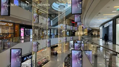 a shopping mall with christmas lights and decorations at JW Marriot Hotel Residence - Two bedroom Suite in Dubai