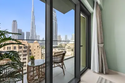 a balcony with a view of the city at Walk to Dubai Mall- Enjoy Burj Khalifa Show in Dubai