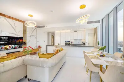 a living room with a couch and a table at Luxury 2 Bedroom plus kids room Burj Khalifa View in Dubai