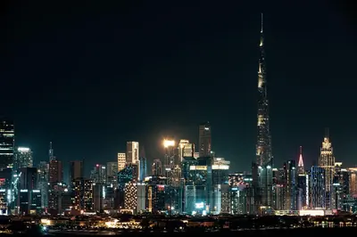 a nighttime view of a large city at night at Luxury 2 Bedroom plus kids room Burj Khalifa View in Dubai