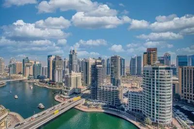 a view of a city with a river and buildings at Chic Waterfront Living - Marina View in Dubai
