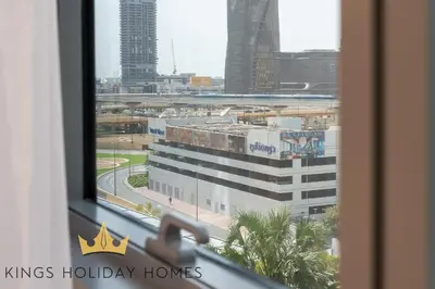 a view of a city from a window of a building at Central Park towers Difc Royal suite kings in Dubai