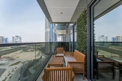 a restaurant with benches and a view of a city at Amazing 1BR Apt in Business Bay - Nobles Tower - Close to Dubai Mall in Dubai