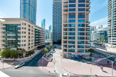 an aerial view of a city with tall buildings at ALiving Cozy Studio with Balcony I Marina Pearl- 407 in Dubai