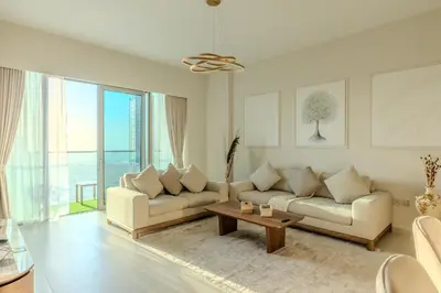 a living room with two couches and a coffee table at 60th High Floor - full World islands, Downtown and Ocean View - high quality Design and Furniture - 2 Bedroom in Dubai