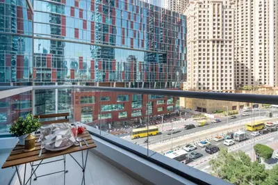 a balcony with a table and a view of a city at Frank Porter - Bay Central in Dubai