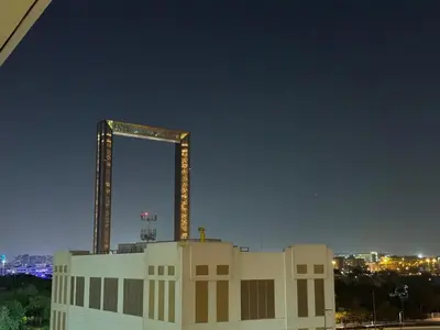 a building with a large mirror on top of it at One Residence - Retreat in Dubai