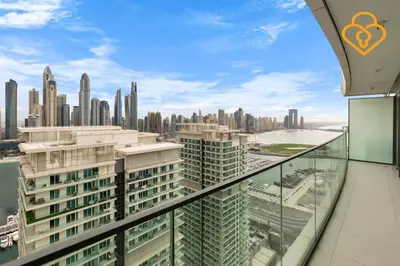 a view of a city from the balcony of a building at Keysplease 2 BR Beach Vista, Emaar Beachfront in Dubai