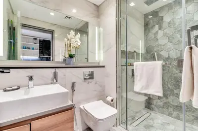a bathroom with a sink toilet and a shower at GuestReady - Business Bay delight in Dubai