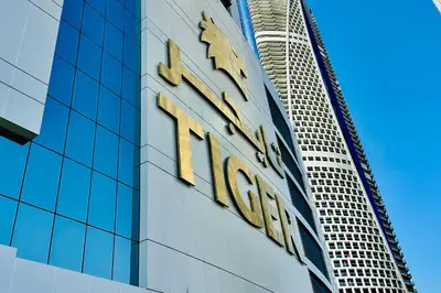 a sign on the side of a building at Vserve 1 BR Stay with Stunning Skyline Views in Dubai