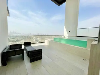 a living room with a large window with a view at Premium 2br Apartment With Private Pool In Jvc in Dubai