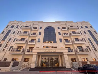 a large building with a sign on the front of it at Frank Porter - Rokane G22 in Dubai