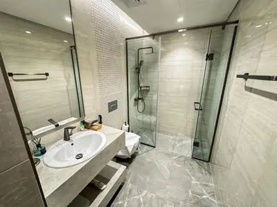 a bathroom with a sink and a shower at Vserve I 1 BR - Luxury Escape in Business Bay in Dubai
