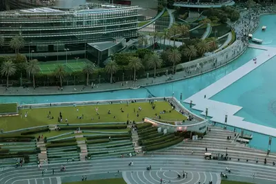 an aerial view of a building with a swimming pool at Best location in Downtown Dubai in Dubai