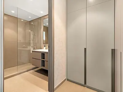 a bathroom with a shower and a sink at Grande Signature 2 Bedroom Apartments I Persian Gulf Views I Free Parking, Gym, Pool, Wi-Fi & PS5 I by Skyline Serenity in Dubai