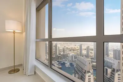 a window with a view of a city at Classy 2BR Apt in Shams1 Panoramic view in JBR in Dubai