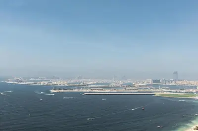 an aerial view of a body of water with boats at King 2 Bedroom Jumeirah Beach & Dubai Eye Views in Dubai