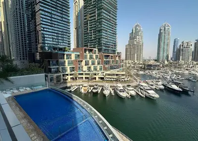 a view of a marina with boats in the water at Maison Privee - Sleek Stay in Dubai Marina Famous Twisting Tower in Dubai