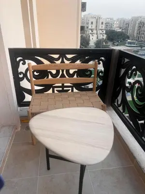 a bench sitting on a balcony with a window at New 1BED Apartment in Remraam, Dubai Land, Motor city, Damac hills, Mudoon area in Dubai