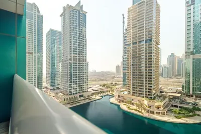 a view of a city with tall buildings and a river at ZenStay - Haven of tranquility and luxury in Dubai