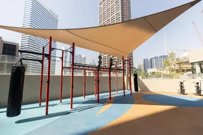 a pavilion with awning in a city with tall buildings at Stunning Studio in Peninsula Five in Dubai