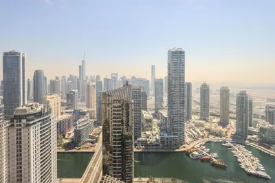 an aerial view of a city with tall buildings at Livbnb - Spacious 2B in Shams with Marina View Walk to Beach in Dubai