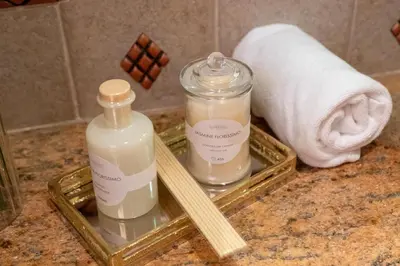 two bottles of soap and chopsticks on a bathroom counter at Samaya Holiday Homes - Luxury Villa Pool - Beach Access & Fishing Zone in Dubai