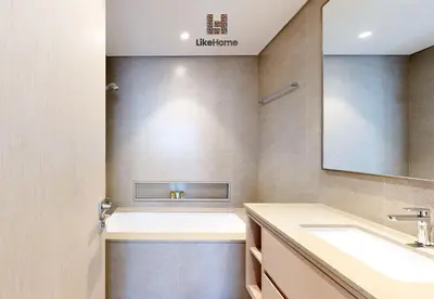 a bathroom with a sink and a mirror at Enjoy Best Burj Khalifa & Fountain Views From Balcony Luxury 2BR 3 Mins from Dubai Mall - Like Home in Dubai