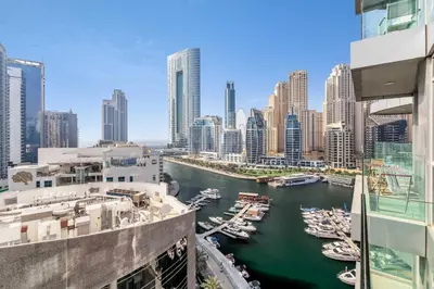 a view of a harbor in a city with boats at GuestReady - Luxe Residence in Dubai Marina in Dubai