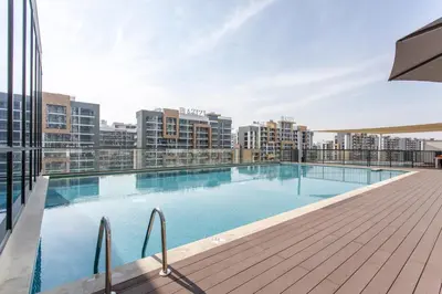 a swimming pool on the roof of a building at STAY BY LATINEM Luxury 1BR Holiday Home W 3516 Near Burj Khalifa in Dubai