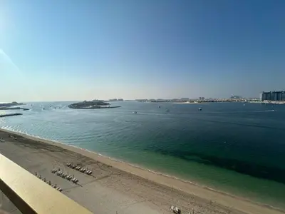 a view of a beach and the ocean at Beach View 1BR at Beachfront 50 Off Eid Offer in Dubai