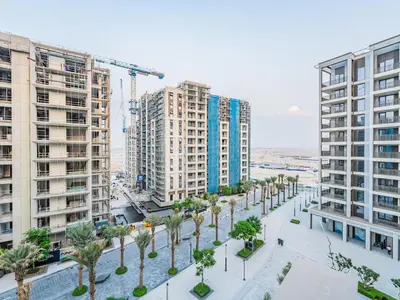 an aerial view of a city with tall buildings at Enjoy Sunset at Creek Beach in Dubai