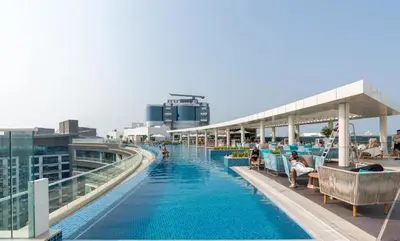 a swimming pool on the top of a building at Luxurious Studio In Seven Palm - Direct Beach Access in Dubai