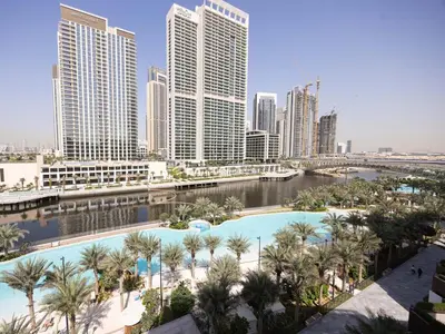 a view of a city with a river and buildings at Beachfront Family Entire Unit in Dubai Ras Al-Khor in Dubai