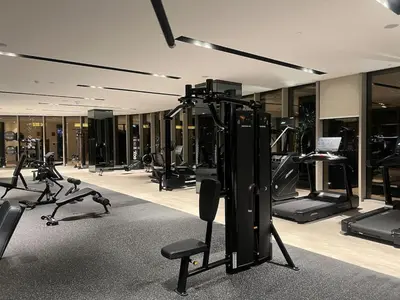 a gym with treadmills and exercise equipment in a building at NEW YEARS Luxury Burj Khalifa and Fountain Views in Dubai
