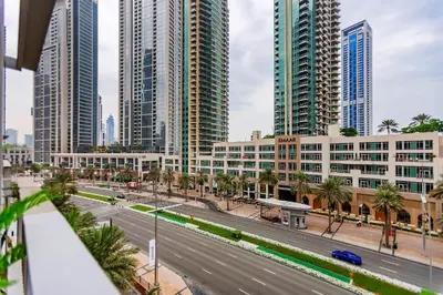a view of a city with tall buildings and a street at Modern Stylish Studio Apartment next to Burj Khalifa walk into Dubai mall in Dubai