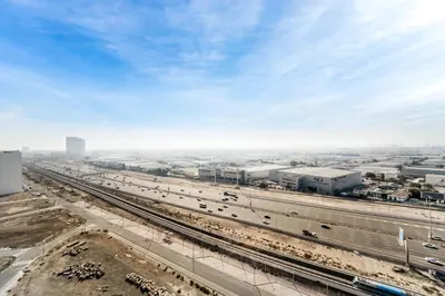 an aerial view of a highway with cars on it at Chic 1 BR with Port Views in Dubai