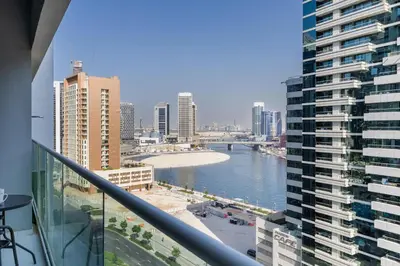 a view of a river in a city with buildings at Reva Residences - Cosy One Bedroom in Business Bay in Dubai