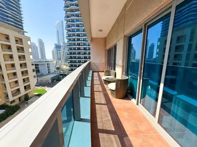 a balcony with a view of a city at Holiday Homes by DO- The Zumrud in Dubai