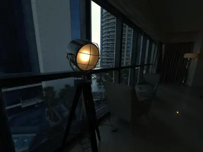 a light on a tripod in a room with a window at HollywoodDXB Burj Khalifa View - 6Min To Dubai Mall in Dubai