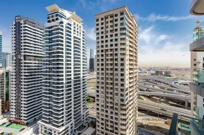 a view of two tall buildings in a city at Great Apartments at Marina Star with City View in Dubai