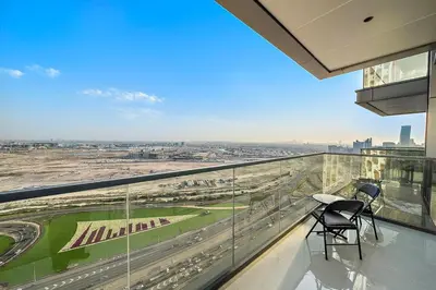 a balcony with a view of a highway at FIRST CLASS 1BR Elegant Modern Retreat in Dubai