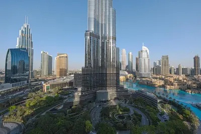 an aerial view of a city with a tall skyscraper at Venetian - Stay at Address Opera with Burj & Fountain views in Dubai