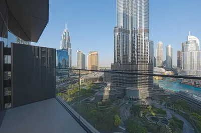 a view of a city from the balcony of a building at Venetian - Stay at Address Opera with Burj & Fountain views in Dubai