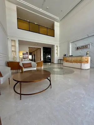 a lobby with a coffee table and a living room at Azizi Riviera 43 in Dubai