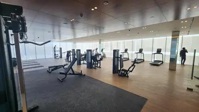 a gym with cardio equipment in a building at Disalvo Smart and Luxury Studio in Dubai