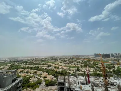 an aerial view of a city with a crane at Ultra Luxury Chic 2Bed in Dubai in Dubai