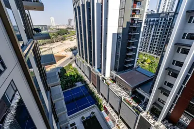 an aerial view of buildings in a city at Luxurious 1BDR apartment in MBR City in Dubai